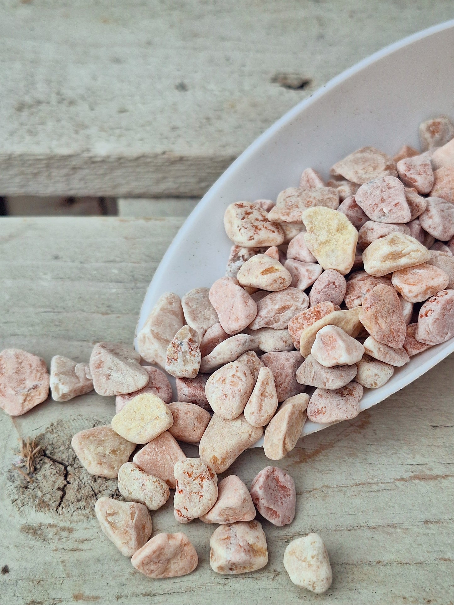 Peachy-pink crushed stone top dressing